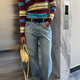 Pletený kardigan s dlouhým rukávem a retro pruhy, zapínání na knoflíky vpředu, přiléhavý střih.