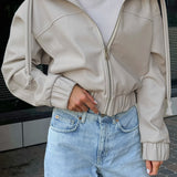 Volná streetwear bunda s kapucí z černé umělé kůže