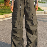 Kalhoty cargo s vysokým pasem ve vojensky zelené barvě