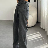Vintage džíny s rovnými nohavicemi a vybledlými výřezy