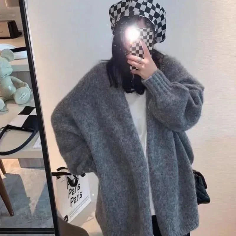 Elegantní, pohodlný a teplý pletený kardigan pro ženy