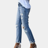 Dámské džíny slim fit - klasický pas - opotřebovaný efekt a roztřepený lem - ležérní styl