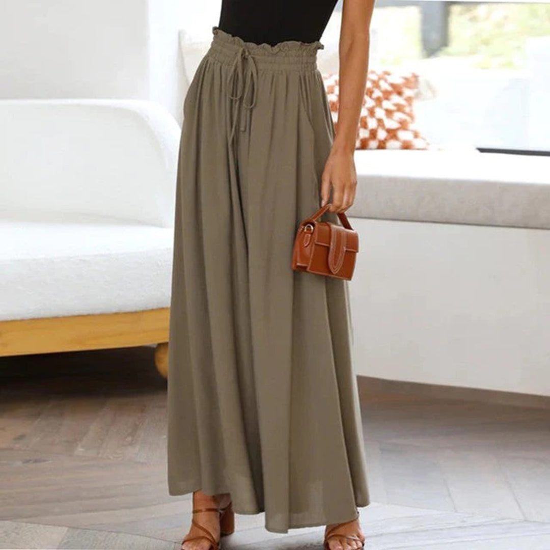 Dámské kalhoty s širokými nohavicemi - Vysoký pas - Splývavá látka - Elegantní a pohodlný styl
