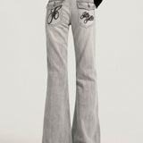 Všestranné kouřově šedé slim bootcut džíny
