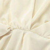 Béžová hedvábná šifonová halenka s vázaným pasem a rozšířenými rukávy, se zavazovacím páskem.