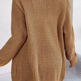 Volná pletená vesta s kapsami