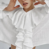 Bavlněná svetrová halenka s volánky a výstřihem do V