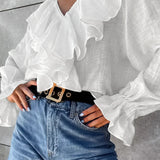 Bavlněná svetrová halenka s volánky a výstřihem do V