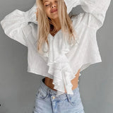 Bavlněná svetrová halenka s volánky a výstřihem do V