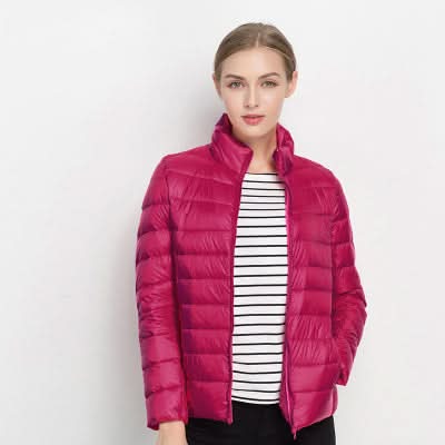 Zářivě zelená péřová bunda, elegantní a pohodlná pro ženy
