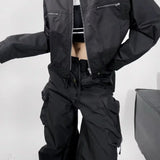 Volná, ležérní bunda Techwear s funkčně střiženým střihem a zapínáním na zip