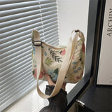 Zimní látková taška přes rameno s potiskem ve tvaru půlměsíce